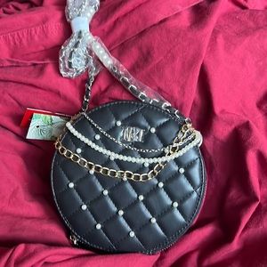 Round crossbody bag
